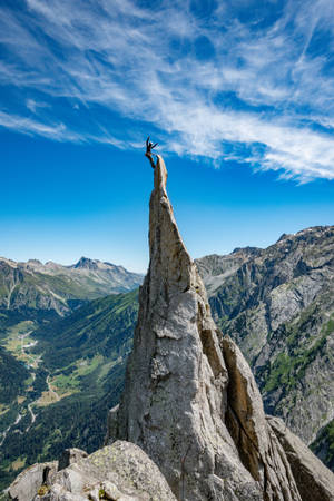 Rock Climbing At The Peak Wallpaper