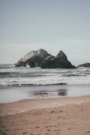 Rock Formations Near Beach Android Wallpaper