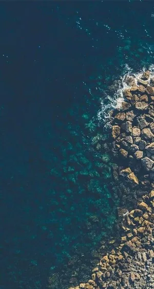 Rocky Beach Shore Home Screen Wallpaper