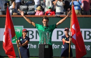 Roger Federer With Two Flags Wallpaper