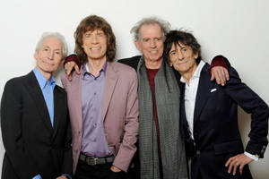 Rolling Stones On Light Gray Wallpaper