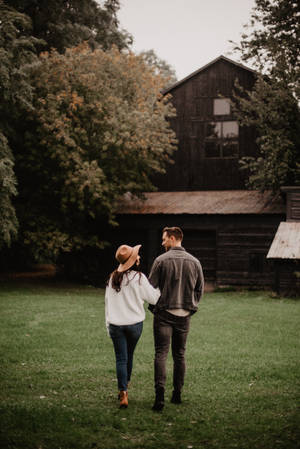 Romantic Country Couple On Cabin Yard Wallpaper