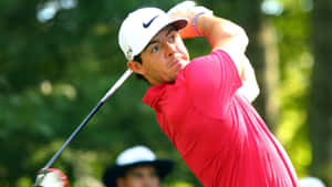 Rory Mcilroy Hits A Drive During The Pga Championship Wallpaper