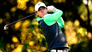 Rory Mcilroyn In White Nike Cap Wallpaper