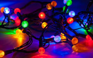 Round Colorful Christmas Lights Wallpaper