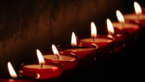 Row Of Candle Lights Wallpaper