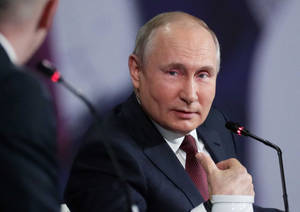 Russian President Vladimir Putin Listening Attentively Wallpaper