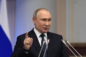 Russian President Vladimir Putin Pointing Upwards Wallpaper