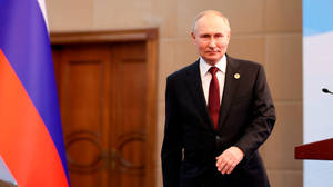 Russian President, Vladimir Putin, Striding Away From Podium Wallpaper