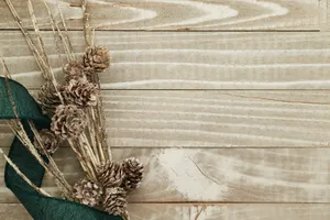 Rustic Elegance Meets Festive Joy In This Picturesque Christmas Table Setting. Wallpaper