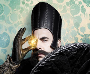 Sacha Baron Cohen Character Time Wallpaper