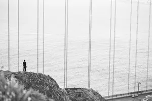 Sad Alone Man At Golden Gate Bridge Wallpaper