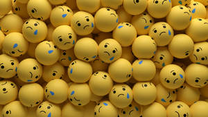 Sad Emoji Balls With Tear Drops Wallpaper