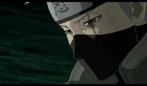 Sad Kakashi Scarred Eye With Sharingan Wallpaper