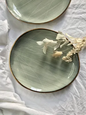 Sage Green Plates And Dried Flowers Wallpaper