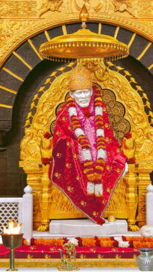 Sai Baba Hd Statue On Throne Wallpaper