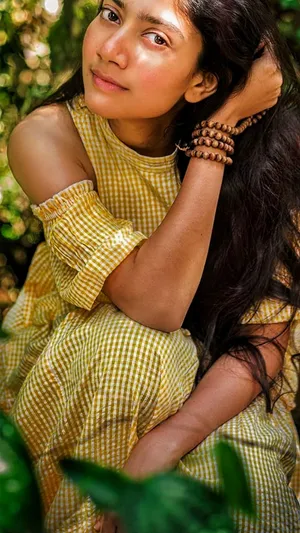 Sai Pallavi In Yellow Dress Wallpaper