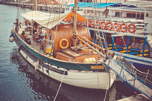 Sailing Boat On Pier Wallpaper