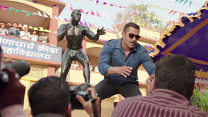 Salman Khan Hd Posing In Front Of Statue Wallpaper