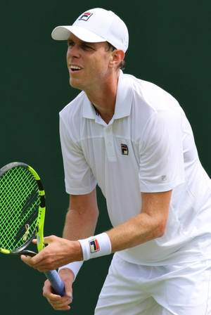 Sam Querrey Anticipating Tennis Serve Wallpaper