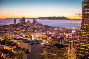 San Francisco Skyline With Evening Sunset Wallpaper