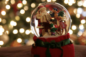 Santa Claus Snow Globe Wallpaper