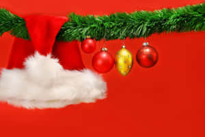 Santa Hat Red And Green Christmas Wallpaper