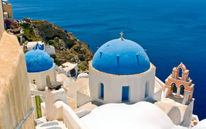 Santorini's Blue Church In Europe Wallpaper