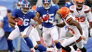 Saquon Barkley Carrying The Ball Wallpaper