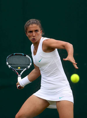 Sara Errani Receiving Tennis Ball Wallpaper