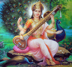 Saraswati Devi With Peacock Wallpaper