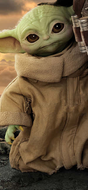 Say Hello To The Newest Addition To Your Phone - Baby Yoda! Wallpaper