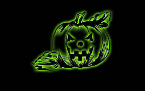 Scary Halloween Glowing Green Pumpkin Wallpaper