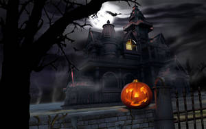 Scary Halloween Pumpkin And Haunted House Wallpaper