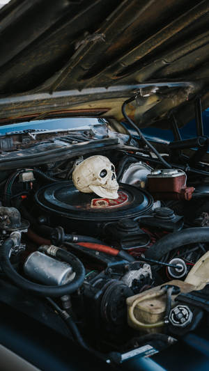 Scary Skull Under Car Hood Wallpaper