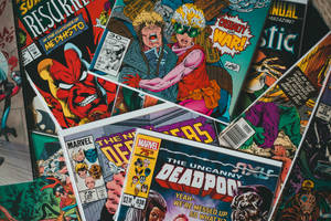 Scattered Cartoon Deadpool And Marvel Comics Wallpaper