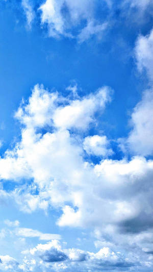 Scattered Clouds Phone Wallpaper