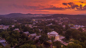 Scenic Drone Shot Of University Of Virginia At Sunset Wallpaper