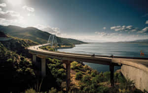 Scenic_ Lake_ Bridge_ Road_ Trip Wallpaper