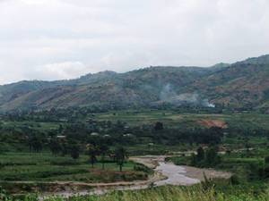 Scenic Landscape Of Rolling Hills In Burundi Wallpaper