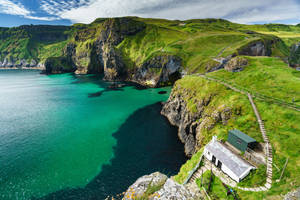 Scenic View Of Carrick-a-rede, Northern Ireland Wallpaper