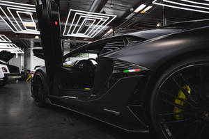 Scissor Door Of Black Sports Cars Wallpaper