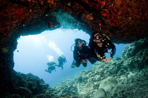 Scuba Diving In Underwater Cave Wallpaper