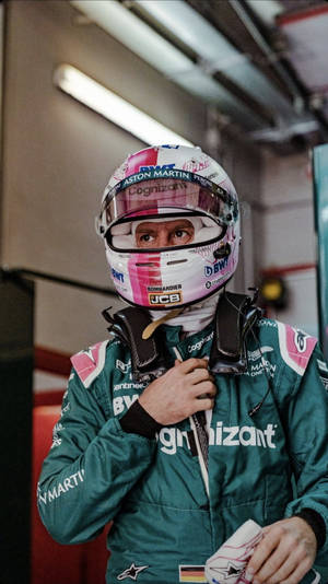 Sebastian Vettel Donned In A Sharp Green Racing Suit Wallpaper