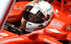 Sebastian Vettel In A Race Car Wallpaper