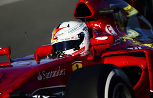 Sebastian Vettel In Action: Commanding The Red F1 Beast Wallpaper