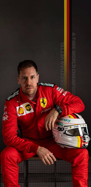 Sebastian Vettel Leaning On His Helmet Wallpaper