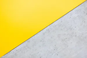 Sectioned Yellow And Gray Backdrop Wallpaper