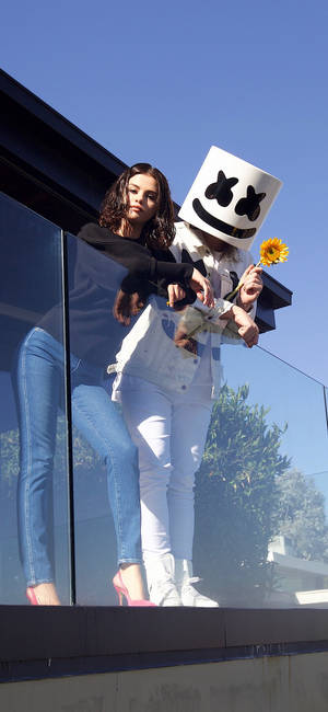 Selena Gomez And Marshmello Hd Iphone Wallpaper