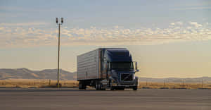 Semi Truck Dawn Parking Lot Wallpaper